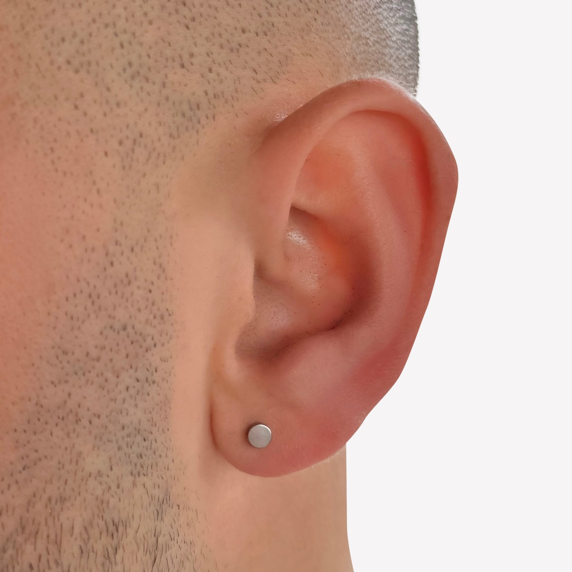 Silver stainless steel faux stretcher stud earring – alternative style for a bold look.